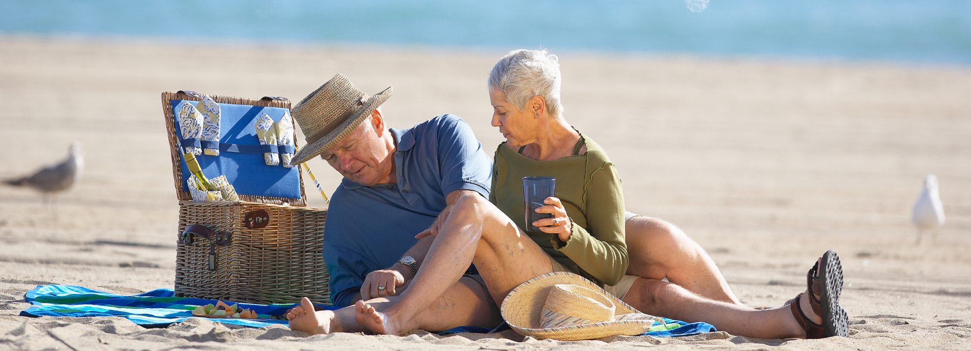 Retired couple on beach