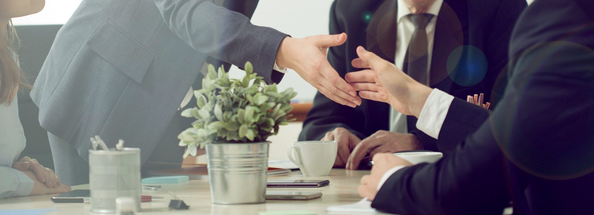 Panorama of handshake on a business meeting